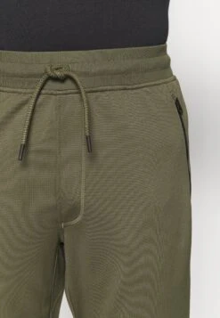 Under Armour Sportstyle - Trainingsbroek - Khaki -Under Armour Winkel 4f2ee80c24794163b35565a6deb68a32