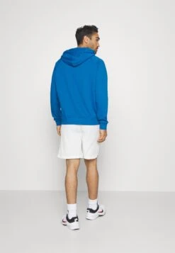 Under Armour Rival Hoodie - Hoodie - Varsity Blue/White -Under Armour Winkel 80b117b0ce1a4c5988175e3ec936acec